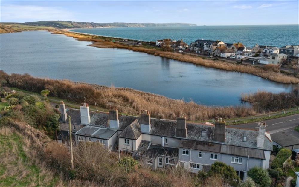 Looking over the cottage, and out over the ley and Start Bay at 2 Florence Cottage in Torcross