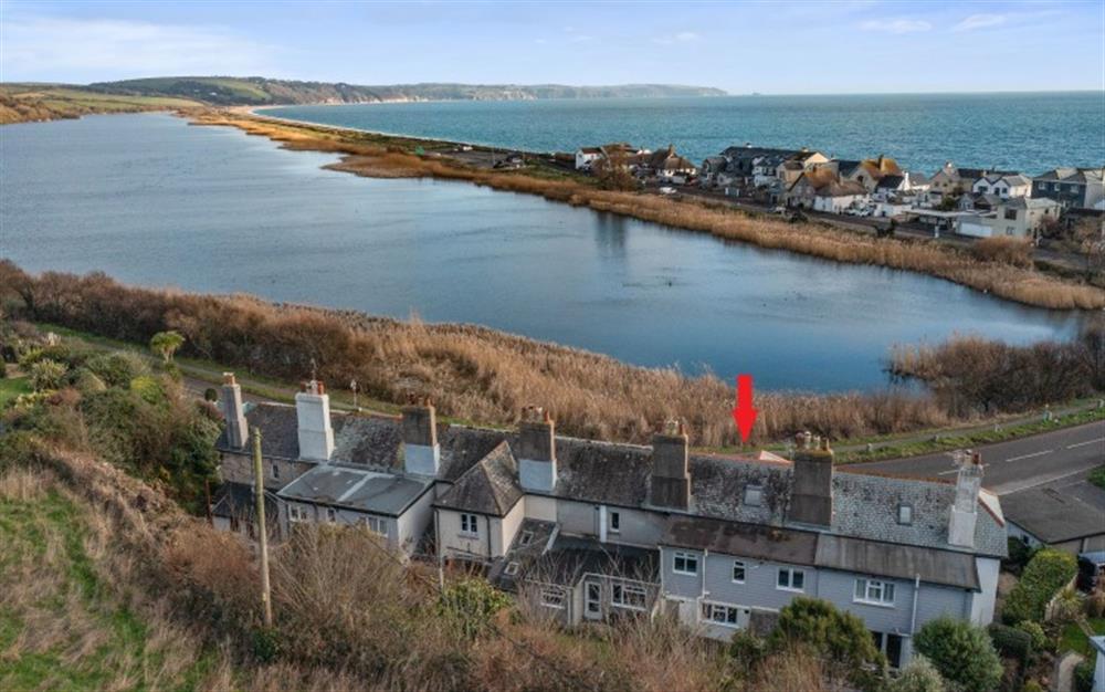 Nestled in the seaside village of Torcross on Slapton Sands, with views over the Slapton Ley Nature Reserve at 2 Florence Cottage in Torcross