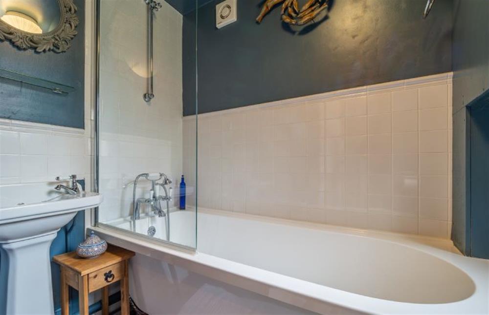 Bathroom with roll-top bath with shower over, wash basin and WC at 2 Fox Cottages, Darsham