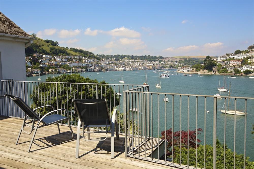 The spacious decking area to the front of the property has lovely river views at 2 Galions Quay in , Dartmouth