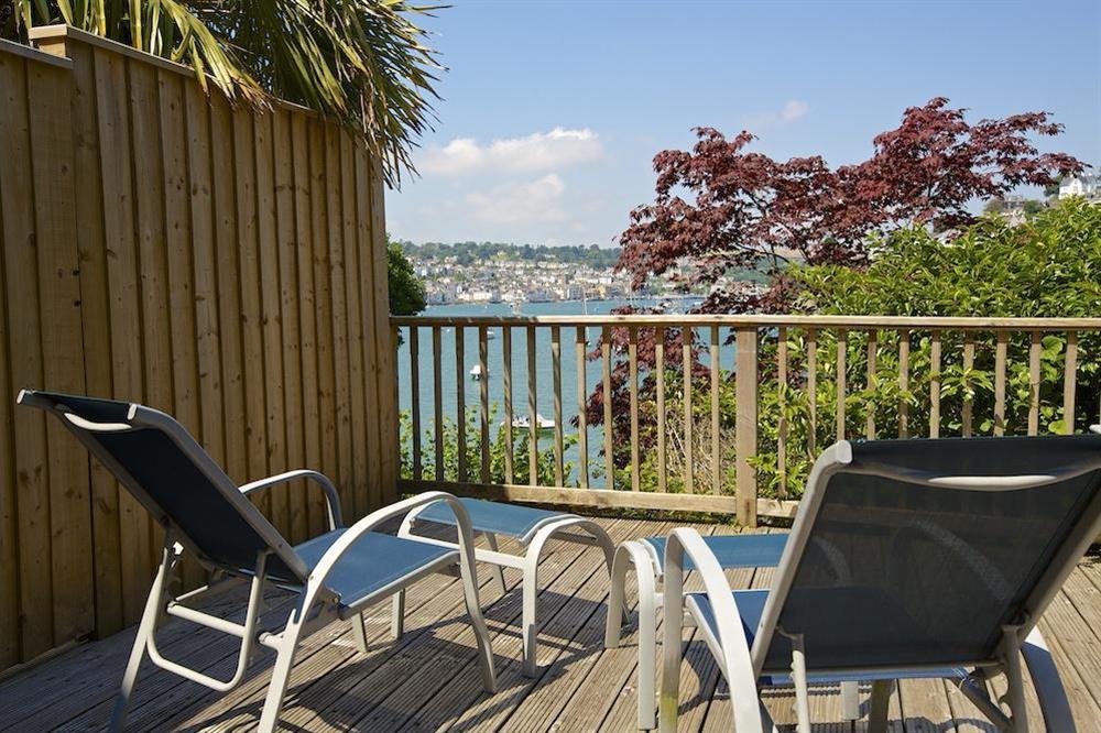 The upper decked balcony has two chairs and stunning views at 2 Galions Quay in , Dartmouth