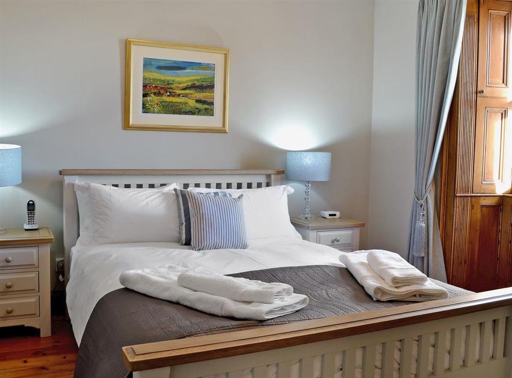Charming double bedroom with king size bed at 2 Girdleness Lighthouse in Aberdeen, Aberdeenshire