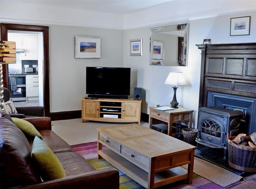 Spacious living room with woodburner at 2 Girdleness Lighthouse in Aberdeen, Aberdeenshire