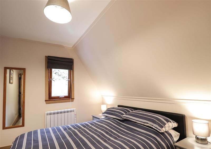 One of the 2 bedrooms at 2 Glen Garry Lodge, Lagan near Invergarry