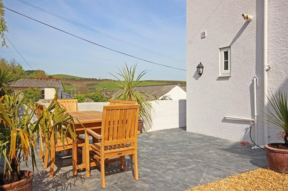 Good sized, sunny terrace to the rear of the house with table and chairs (photo 2) at 2 Gould Road in , Salcombe