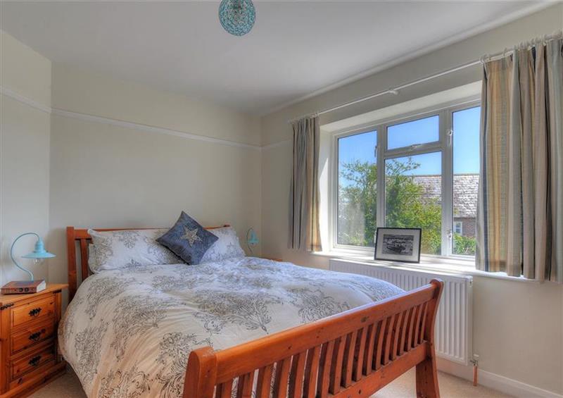 One of the bedrooms at 2 Grange Villas, Charmouth