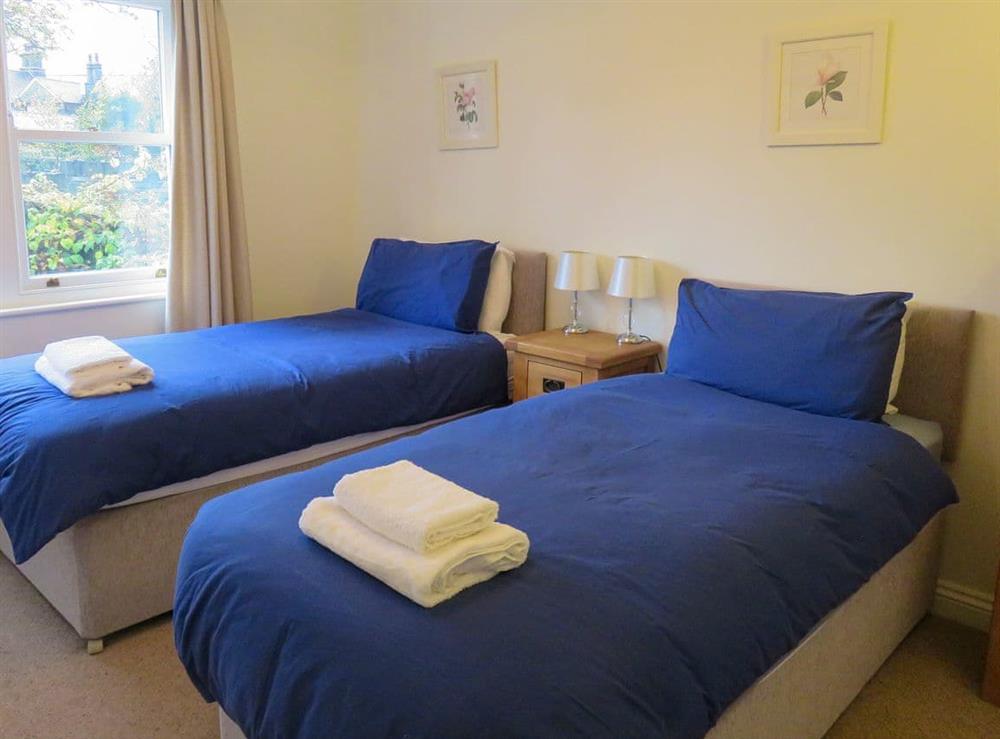 Twin bedroom at 2 Greta Grove House in Keswick, Cumbria