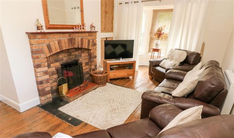 Relax in the living area at 2 Gymmin House, Pendine