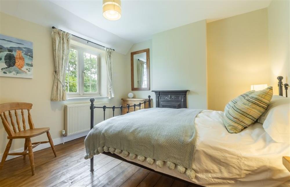 First floor: Bedroom two with super-king bed at 2 Hall Lane Cottages, Thornham near Hunstanton