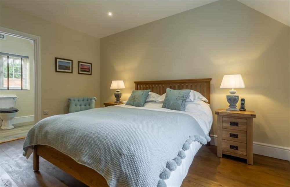 First floor: Master bedroom  at 2 Hall Lane Cottages, Thornham near Hunstanton