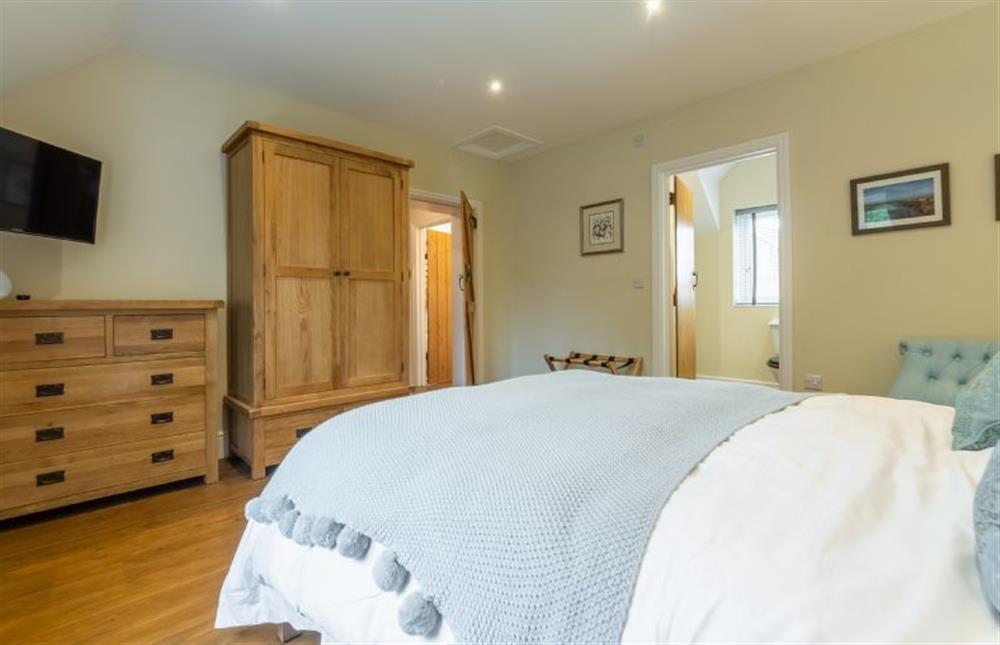 irst floor: Master bedroom  at 2 Hall Lane Cottages, Thornham near Hunstanton