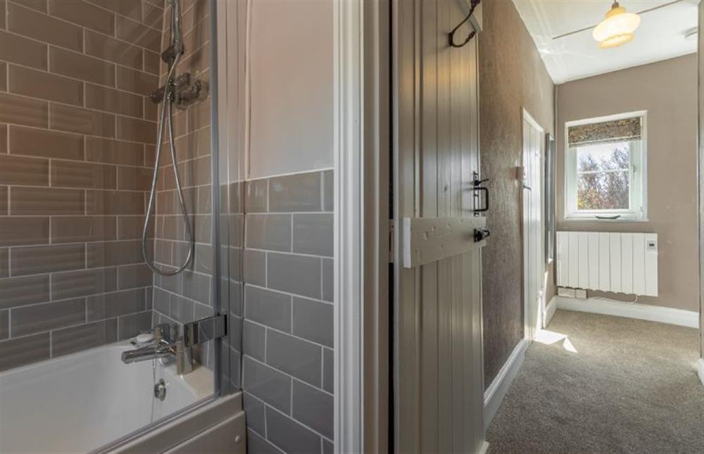 First floor: Bathroom view to the landing at 2 Hammond Square, Weybourne near Holt