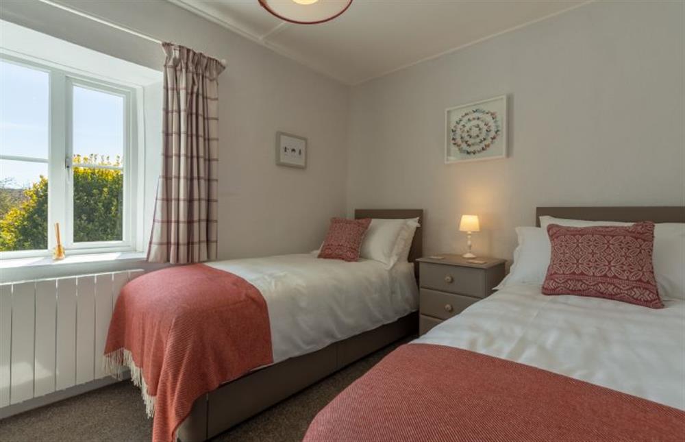 First floor: Bedroom two showing twin beds at 2 Hammond Square, Weybourne near Holt