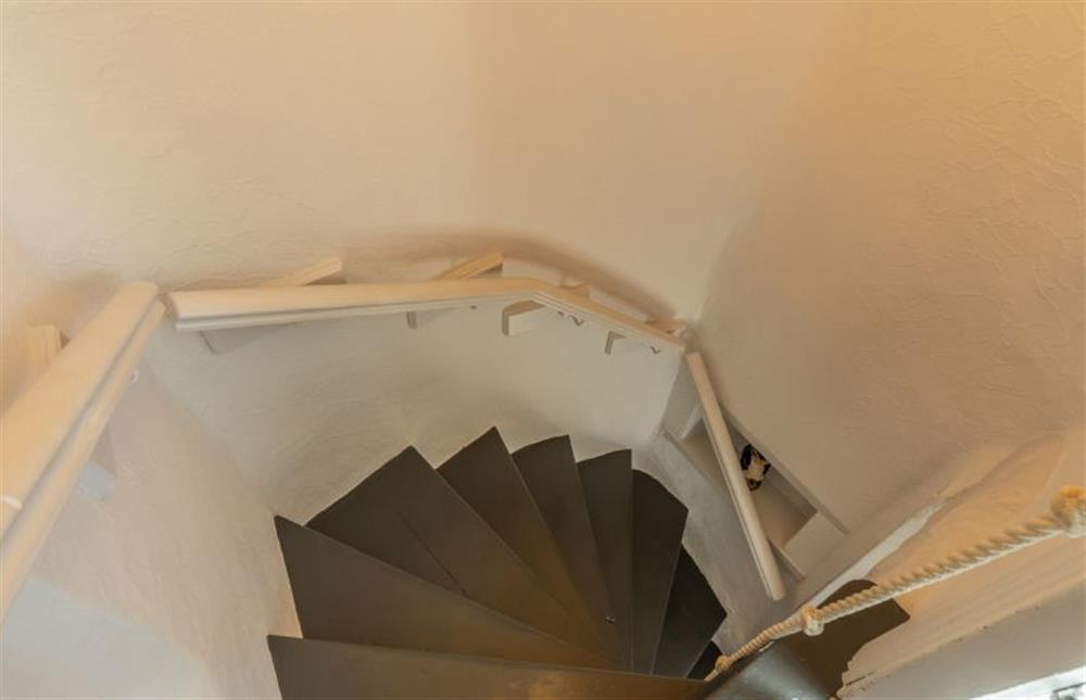 First floor: Looking down the steep Norfolk winder stairway at 2 Hammond Square, Weybourne near Holt