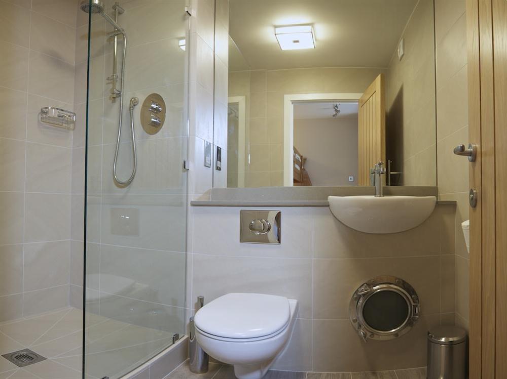 En suite shower room adjacent to the family suite at 2 Hamstone Court in , Salcombe