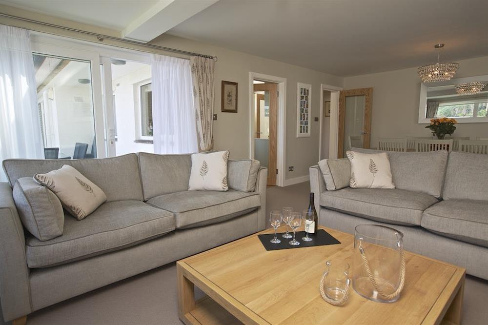 Large lounge with doors leading to the balcony at 2 Hamstone Court in , Salcombe