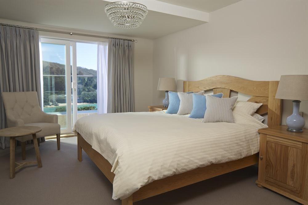 Second double bedroom with super-King size bed and access to the balcony at 2 Hamstone Court in , Salcombe