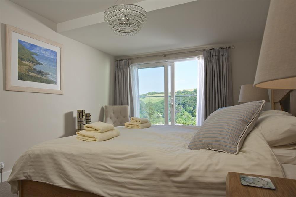 Second double bedroom with super-King size bed and doors leading out to the balcony at 2 Hamstone Court in , Salcombe
