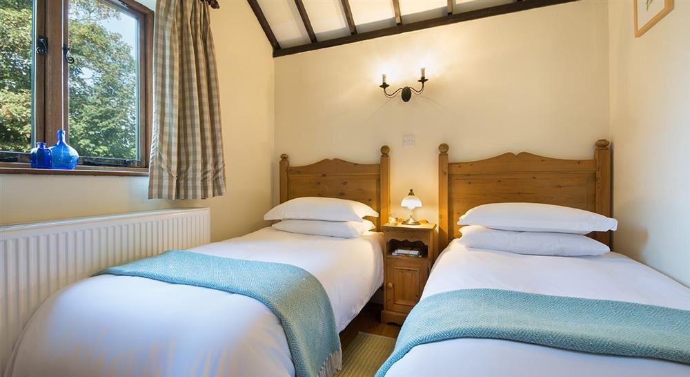 The large twin bedroom at 2 Horsey Barns in Horsey, Norfolk