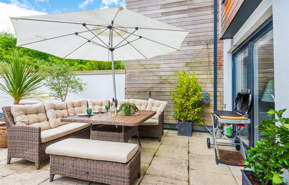 Enjoy a cup of tea on the patio at 2 Island Place (Harbour Lights) in Salcombe