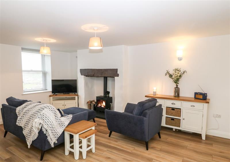 Relax in the living area at 2 Llain Ffynnon, Groeslon