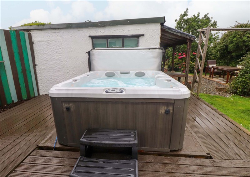 There is a hot tub at 2 Llainwen, Pencarnisiog near Rhosneigr