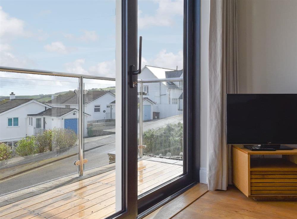 Living area with balcony access at 2 Lyndhurst in Salcombe, Devon