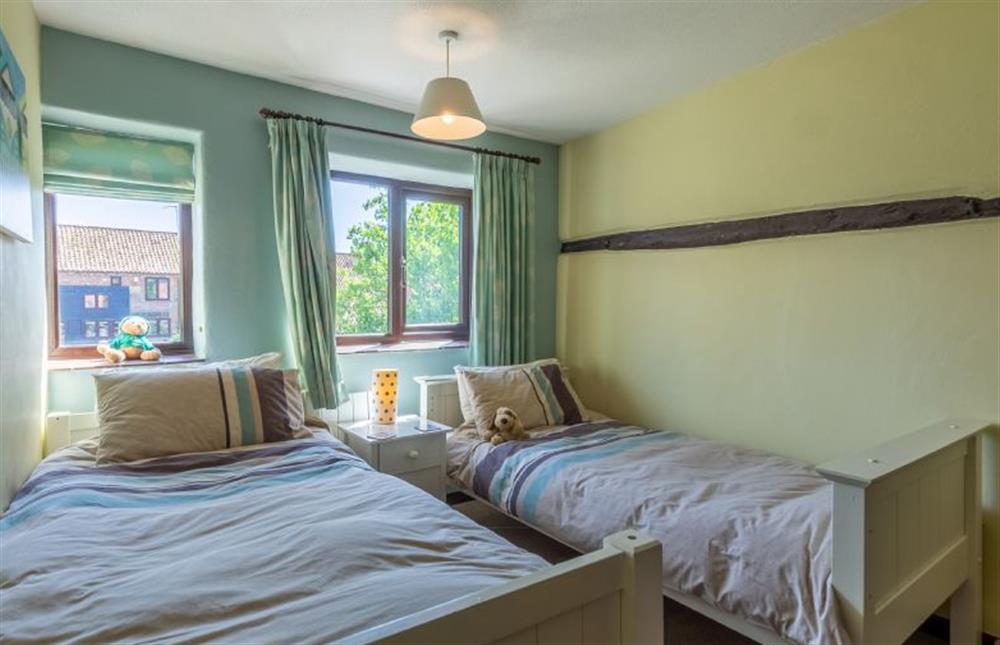 First floor: Bedroom two with twin beds at 2 Manor Court, Syderstone near Kings Lynn
