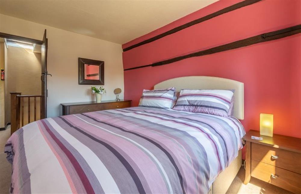 First floor: Master bedroom with king-size bed (photo 2) at 2 Manor Court, Syderstone near Kings Lynn
