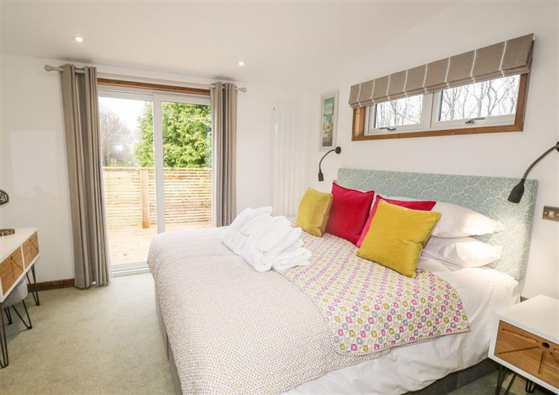 One of the bedrooms at 2 Meadow Retreat, Dobwalls