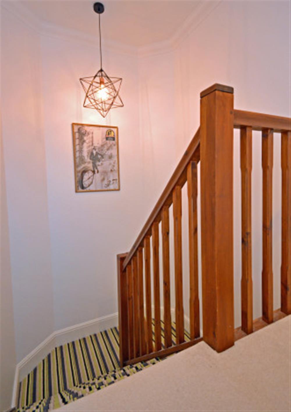 The stairwell leading from first floor to second floor. at 2 North Castle Mews in Totnes