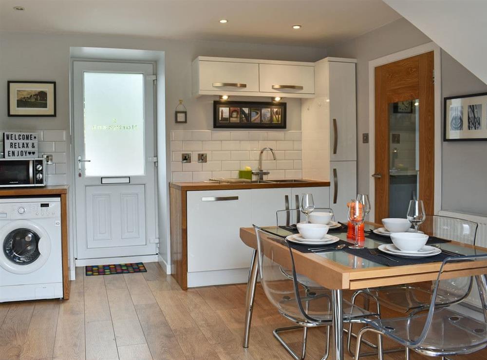 Light and airy kitchen/dining room at 2 Northbank Cottages in Whiting Bay, Isle of Arran, Scotland