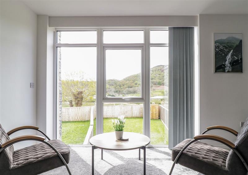Relax in the living area at 2 Pensyflog Barns, Porthmadog