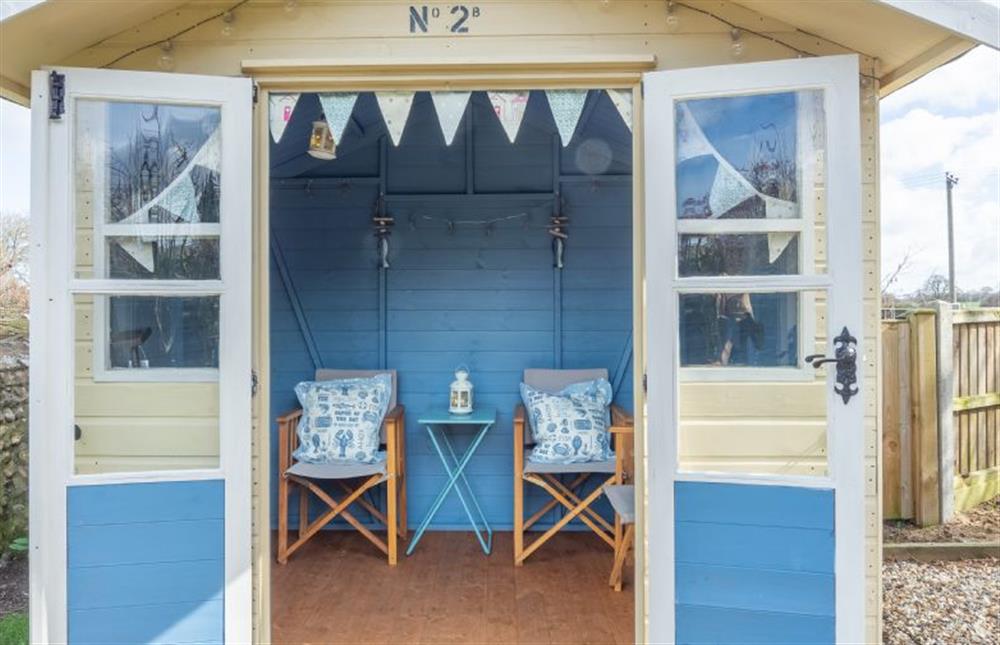 Beach hut themed summerhouse at 2 Providence Place, Thornage near Melton Constable