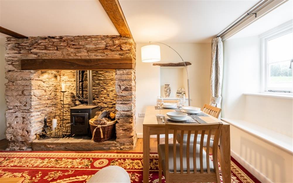 Tasteful and cosy throughout with a log burner for that much needed winter break. at 2 Rose Cottages in Sherford