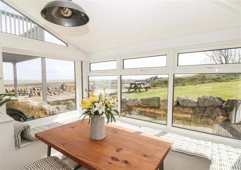Relax in the living area at 2 Salt Cottage, Port Eynon