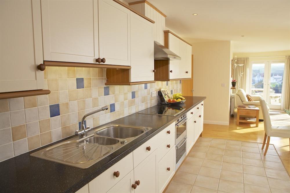 Elegant kitchen with Corian work surfaces (photo 2) at 2 Sea Gardens in Hope Cove, Nr Kingsbridge