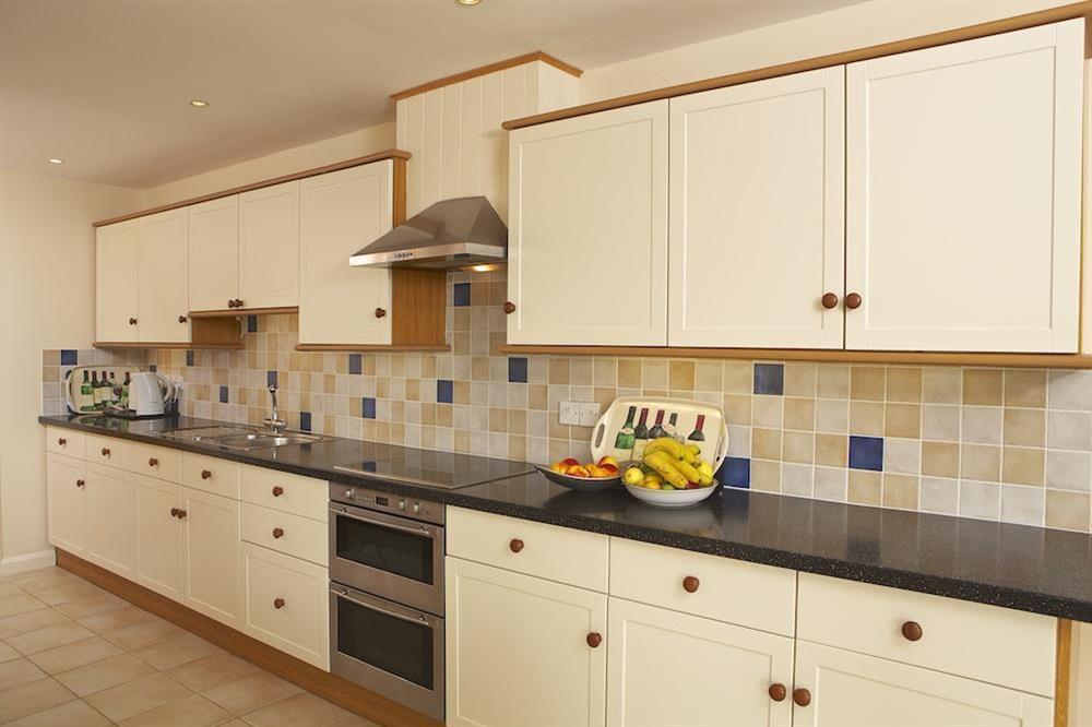 Elegant kitchen with Corian work surfaces at 2 Sea Gardens in Hope Cove, Nr Kingsbridge