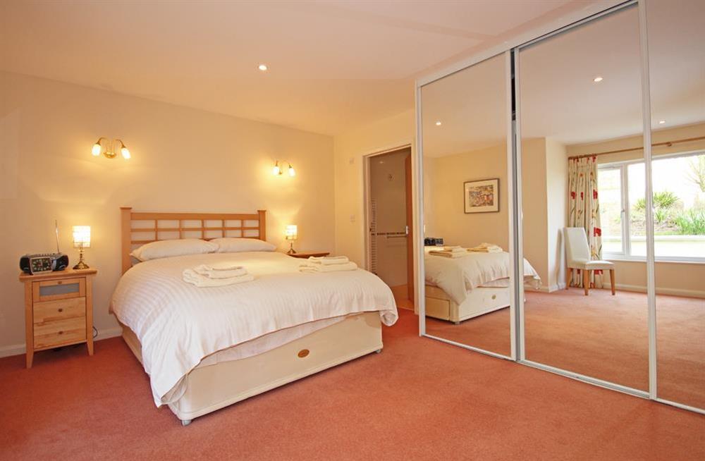 En suite master bedroom with King size bed at 2 Sea Gardens in Hope Cove, Nr Kingsbridge