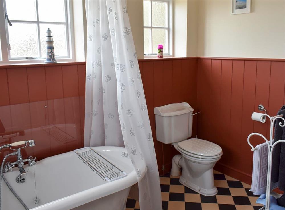 Bathroom with roll-top bath at 2 Sneaton Hall in Sneaton, near Whitby, North Yorkshire