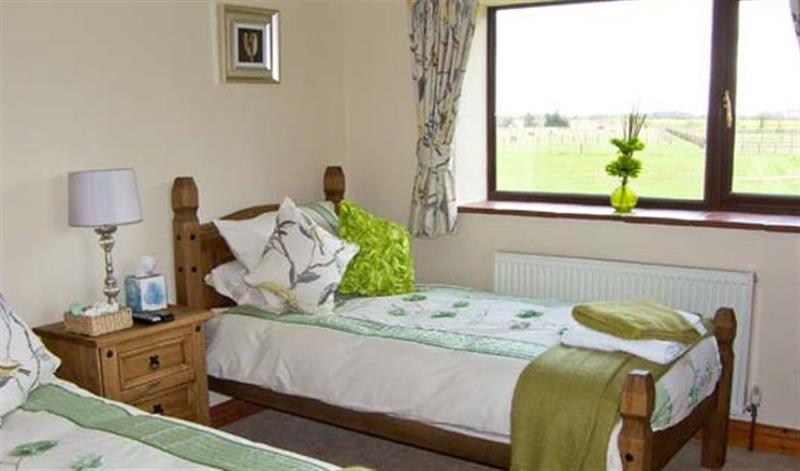 A bedroom in 2 Stud Cottage at 2 Stud Cottage, Coltishall
