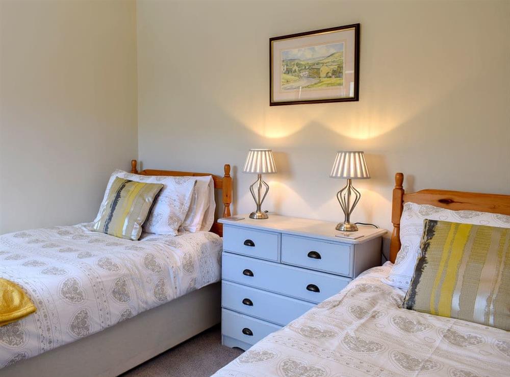Twin bedroom at 2 Swallowholm Cottages in Arkengarthdale, near Reeth, North Yorkshire