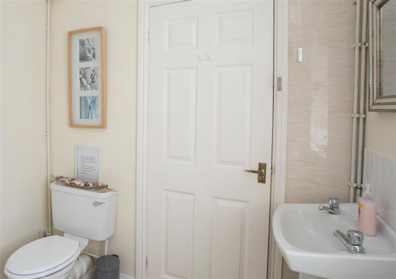 This is the bathroom at 2 The Coach House, Red Wharf Bay near Benllech