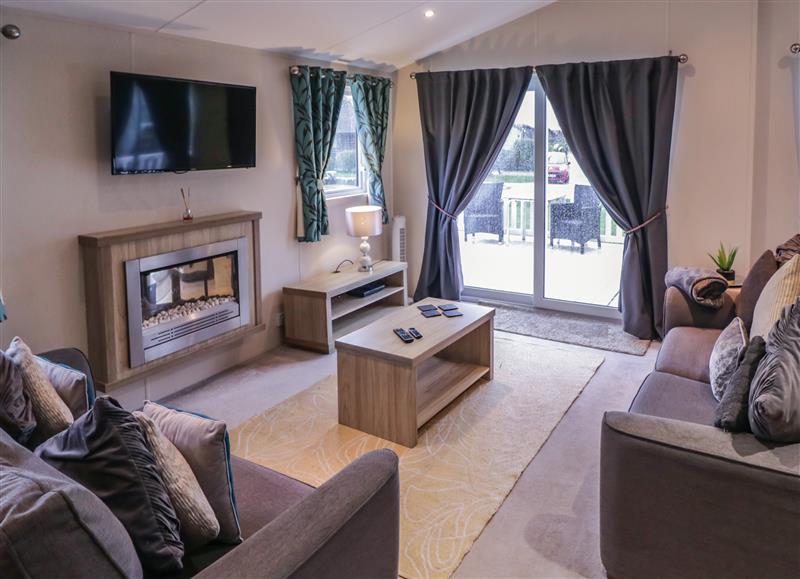 Relax in the living area at 2 The Green, Tattershall Lakes Country Park