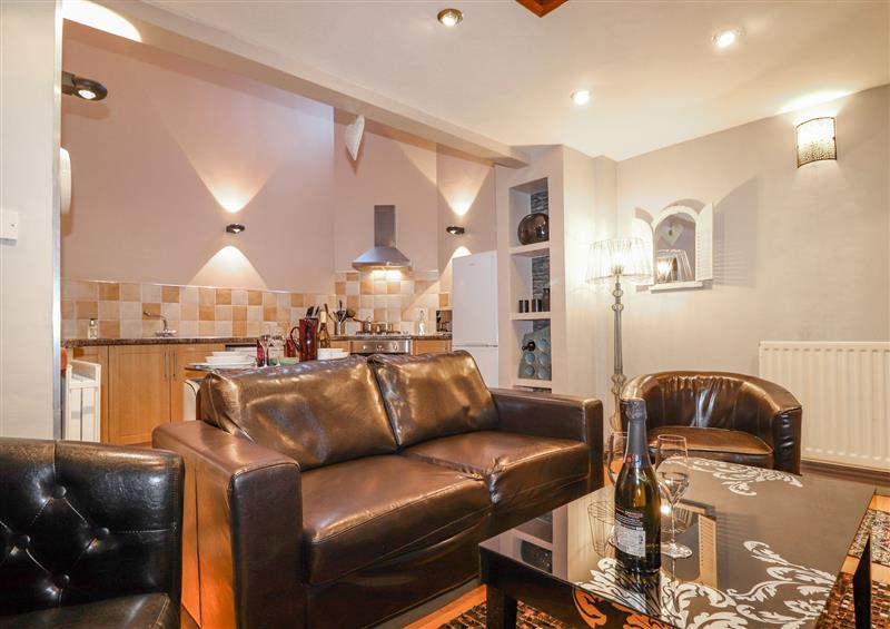 Relax in the living area at 2 The Old Coach House, Ambleside