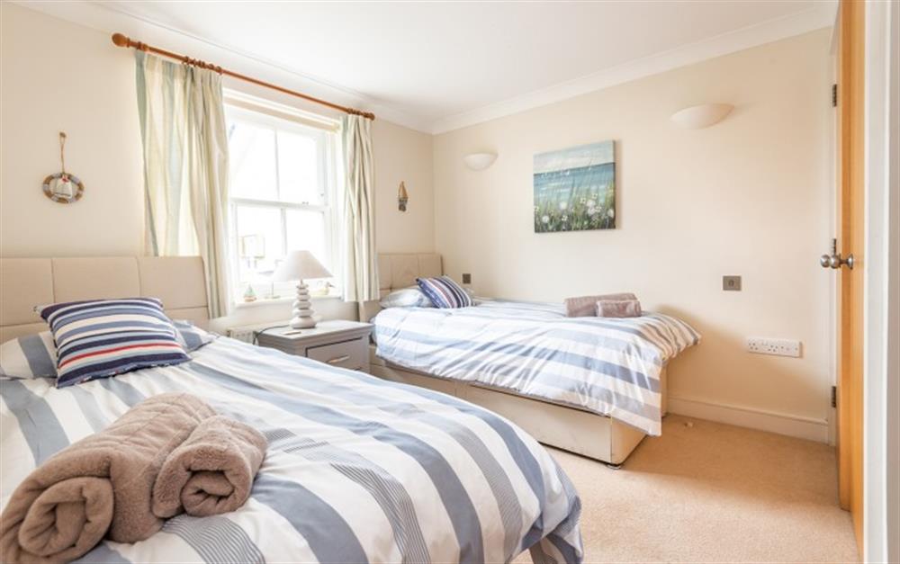 The twin bedroom at 2 Thurlestone Beach Apartments in Thurlestone