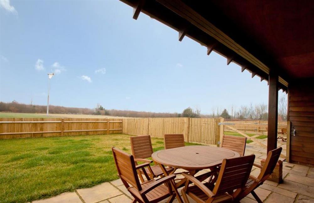 Garden and outdoor seating at 2 Tilmangate Farm, Ulcombe, Kent