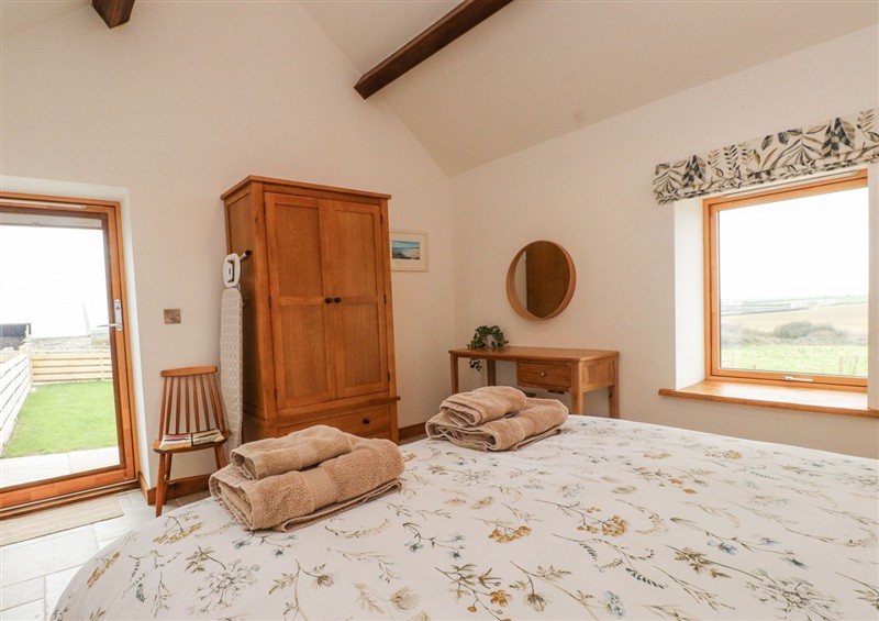 A bedroom in 2 Trem Y Mor (photo 2) at 2 Trem Y Mor, Llanfwrog near Llanfachraeth
