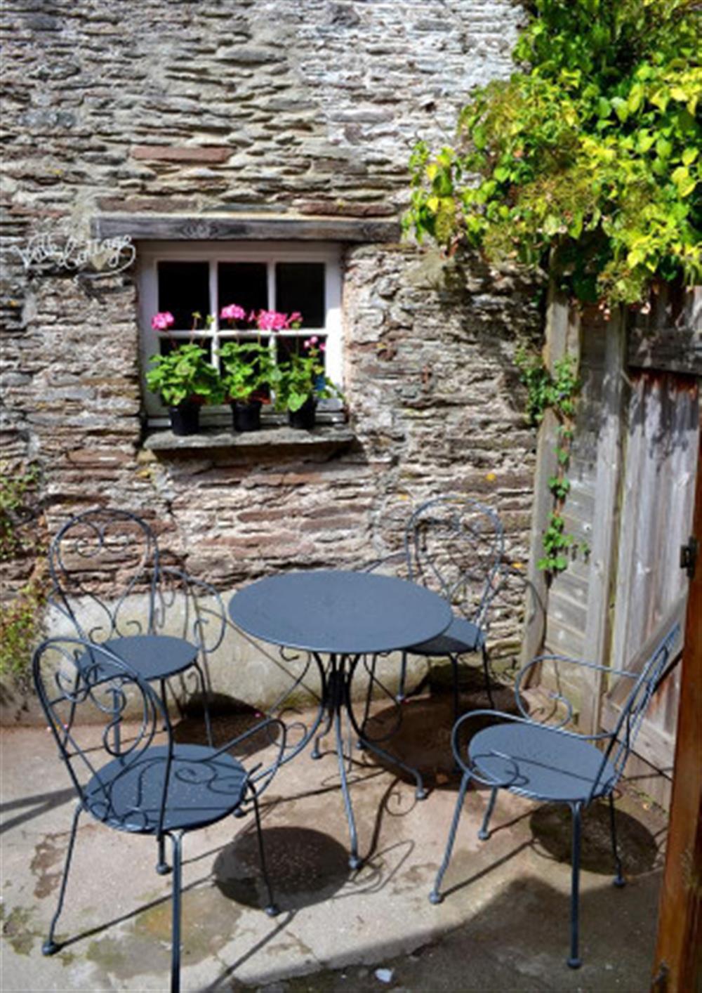 The sunny rear courtyard. at 2 Vale Cottage in Slapton