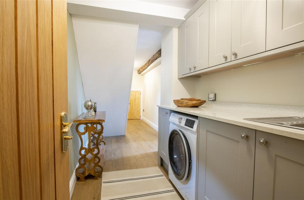The utility room with a washer/dryer